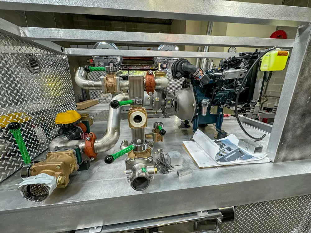 Open compartment interior during fabrication, photo 184 of 303.